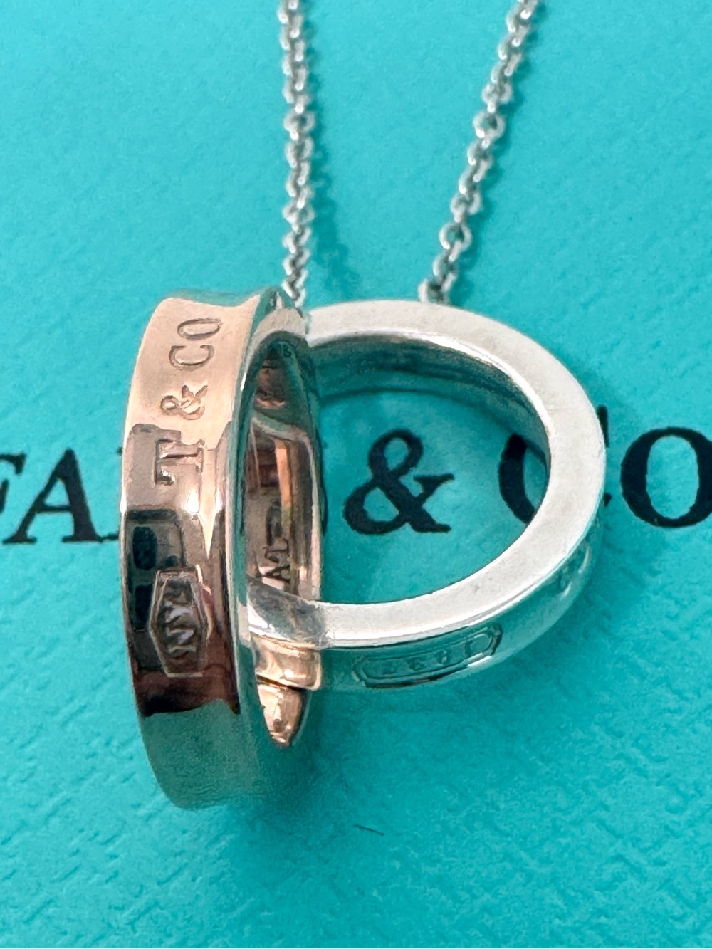 Authentic Tiffany & Co. 1837 Interlock Silver/ Rubedo Metal Circles Necklace.